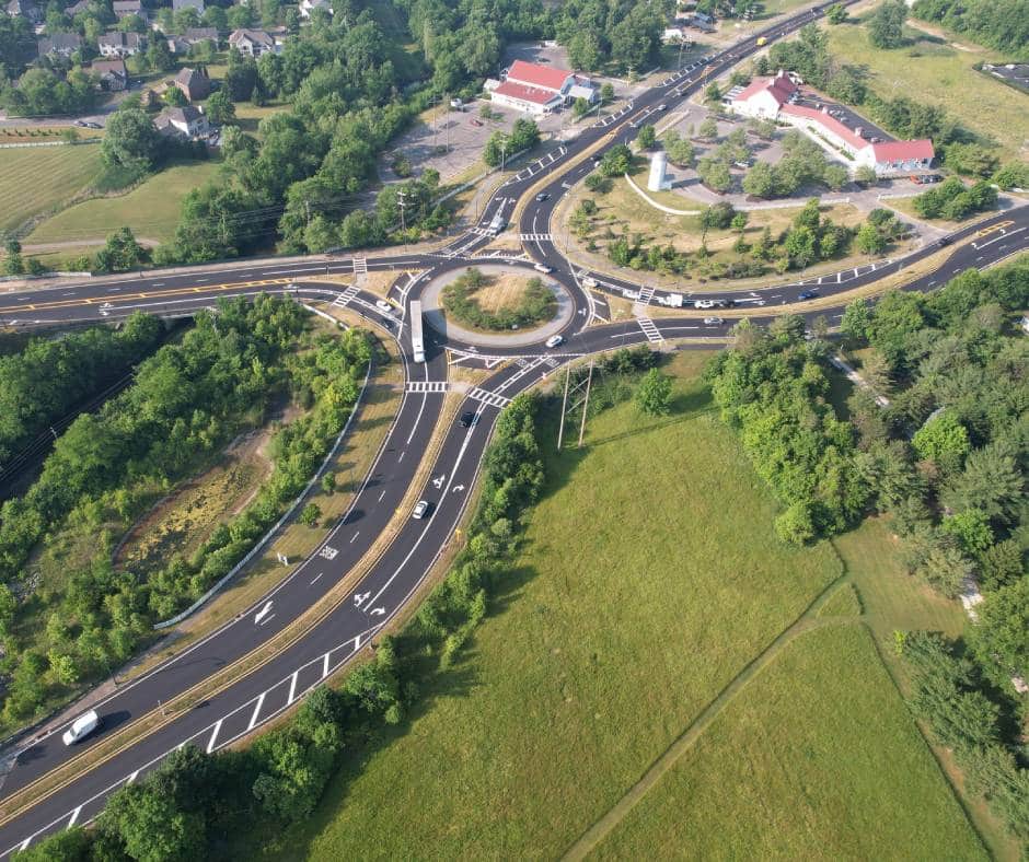 An arial view of a highway with roundabout.